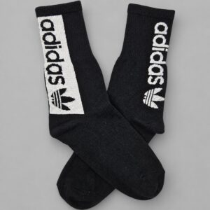 Medias Adidas negras franja blanca — Vista principal sobre fondo gris
