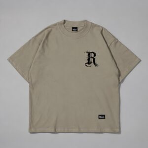 Remera boxy Remark camel Rituals — Prenda · frente sobre fondo gris